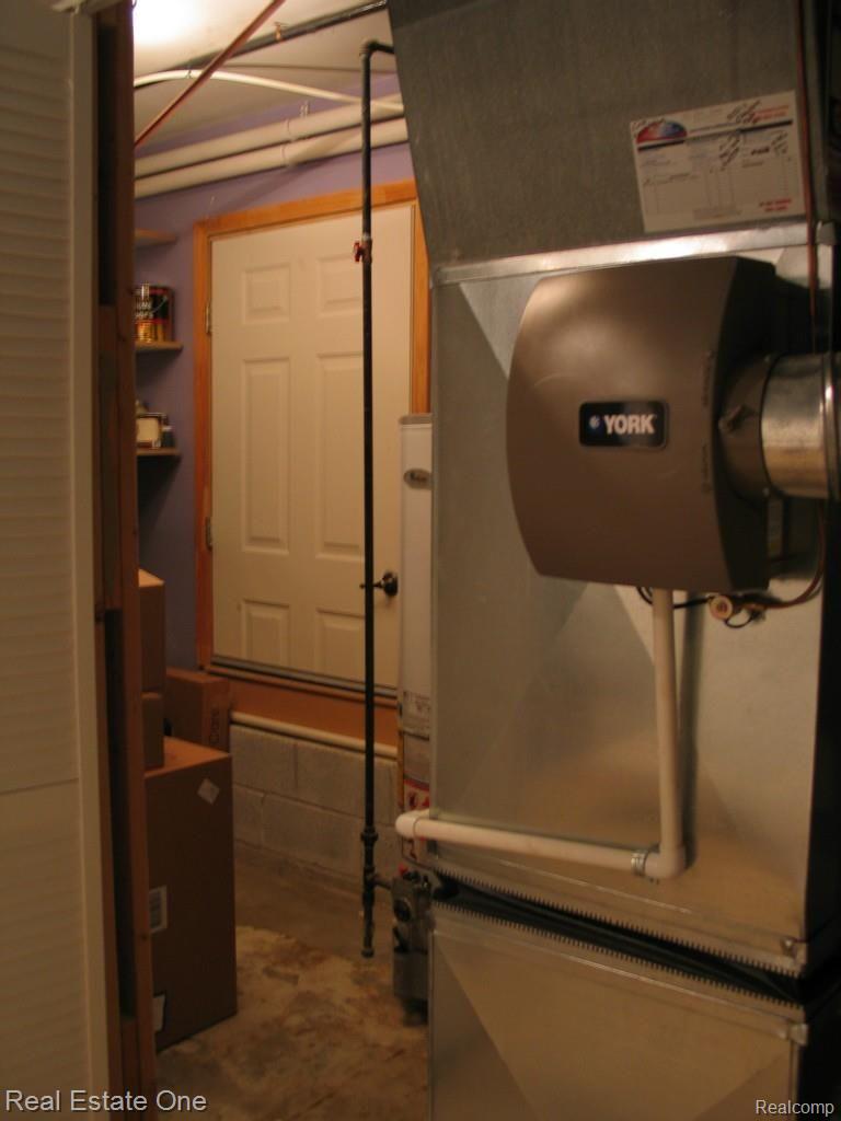 820 Brighton Lake Road Brighton, MI 48116 - Photo 40 of 42 Storage, utilities and wine cellar
