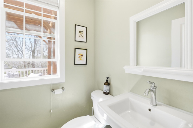353 Robin Street Smithfield, UT 84335 - Photo 20 of 70 Half bathroom featuring toilet and a sink