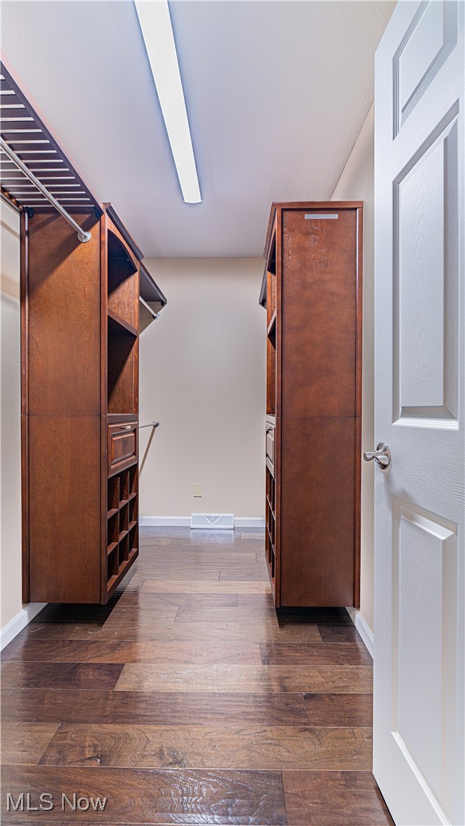 6264 Herbert Road Canfield, OH 44406 - Photo 19 of 47 Spacious closet with dark wood finished floors