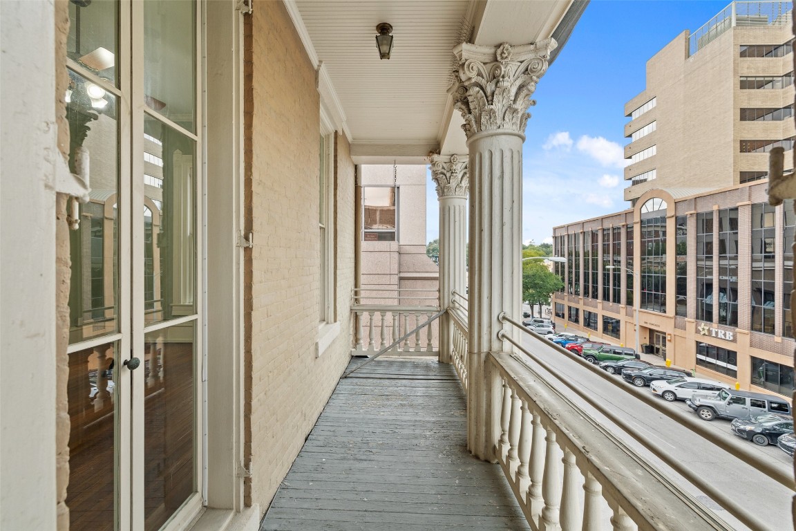 109 East 10th Street Austin, TX 78701 - Photo 29 of 38 a view of a balcony with wooden floor