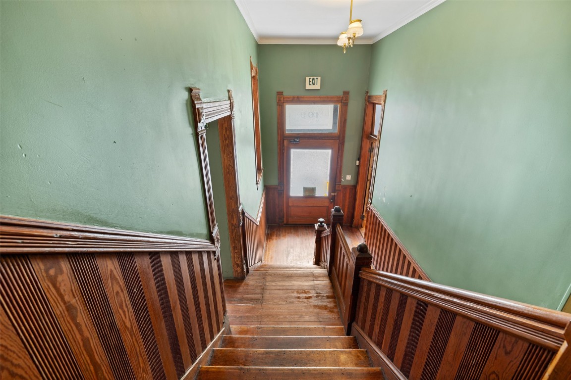 109 East 10th Street Austin, TX 78701 - Photo 9 of 38 a view of a hallway with staircase