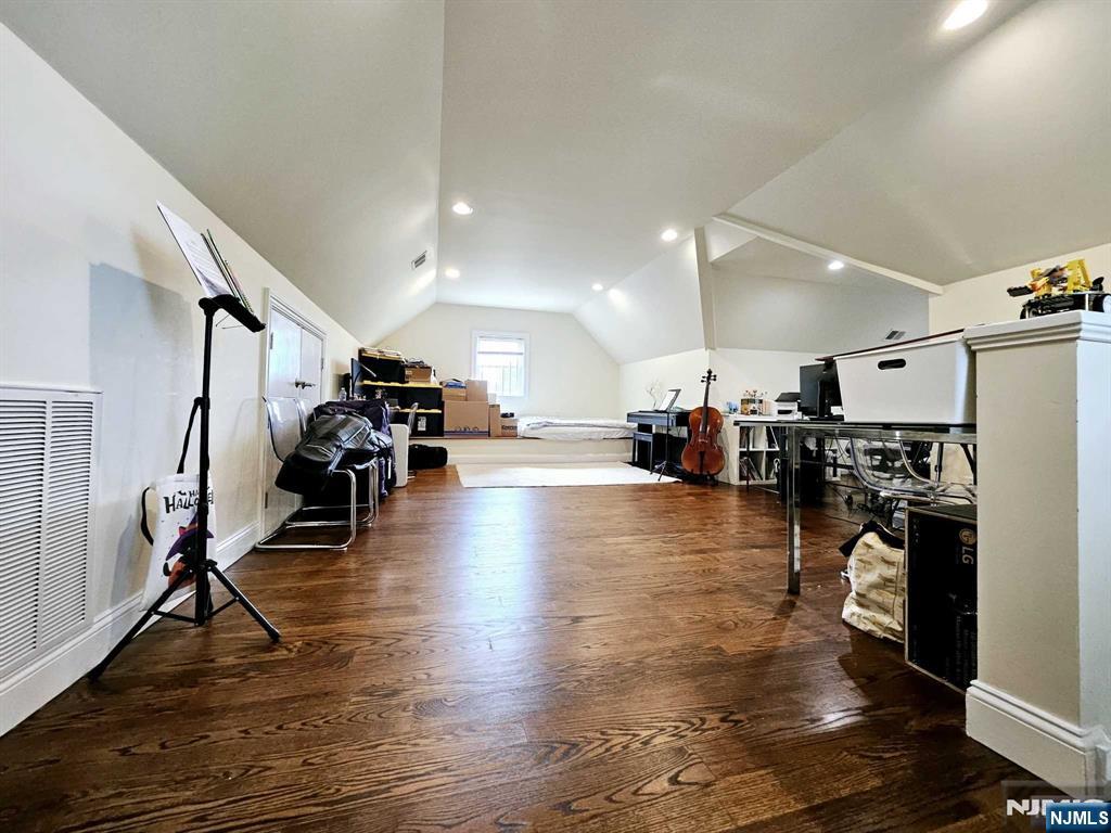 228 County Road, Unit 2 Tenafly, NJ 07670 - Photo 11 of 13 a view of a room with gym equipment and wooden floor