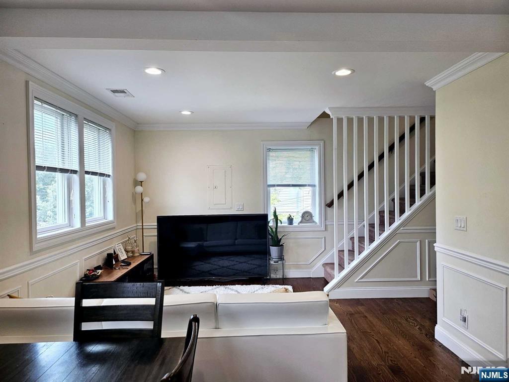 228 County Road, Unit 2 Tenafly, NJ 07670 - Photo 4 of 13 a living room with stairs and a fireplace
