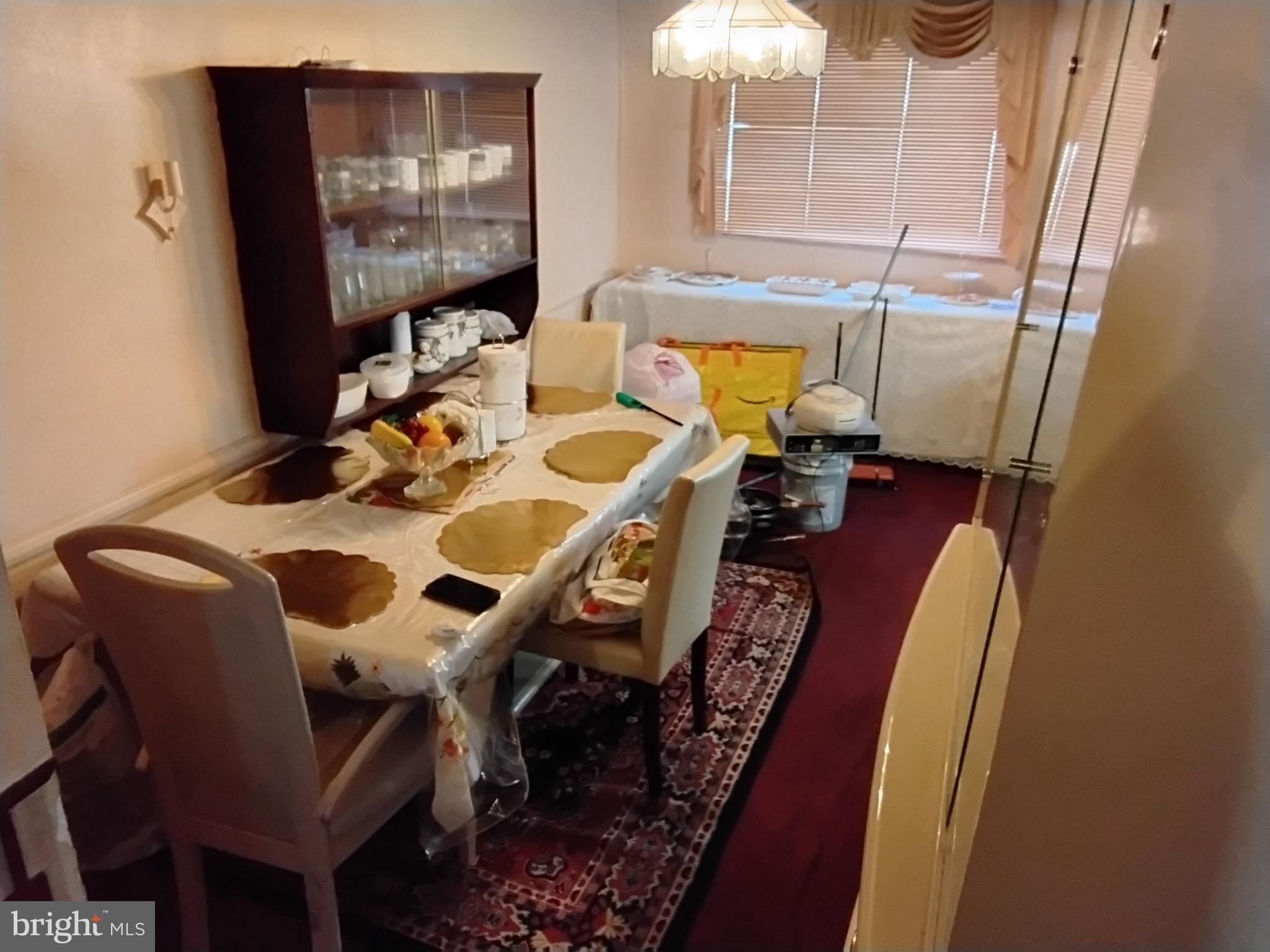 27 Concord Road Darby, PA 19023 - Photo 3 of 14 a view of a dining room with furniture and wooden floor
