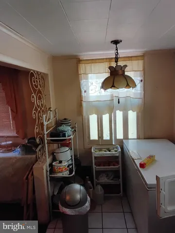 a kitchen with stainless steel appliances granite countertop a stove and a refrigerator