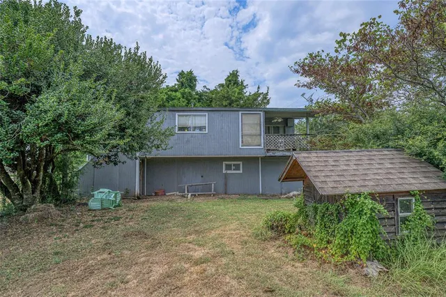 a house view with a garden space