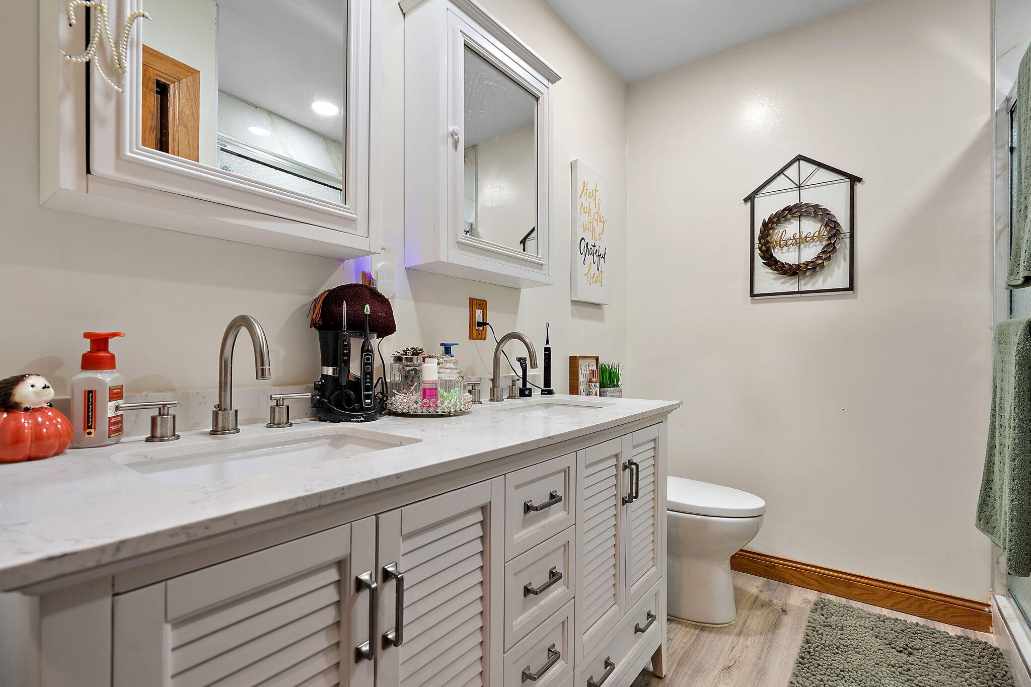 706 North Colfax Street Griffith, IN 46319 - Photo 12 of 25 a kitchen with a sink and a stove
