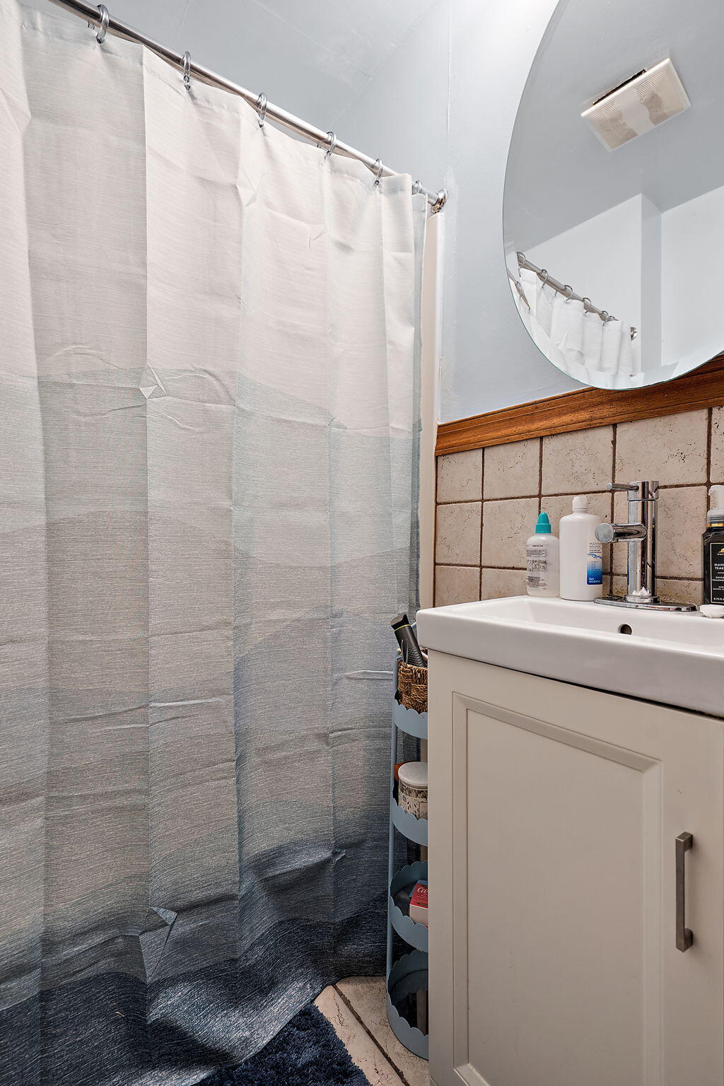 706 North Colfax Street Griffith, IN 46319 - Photo 16 of 25 a bathroom with a sink and a shower
