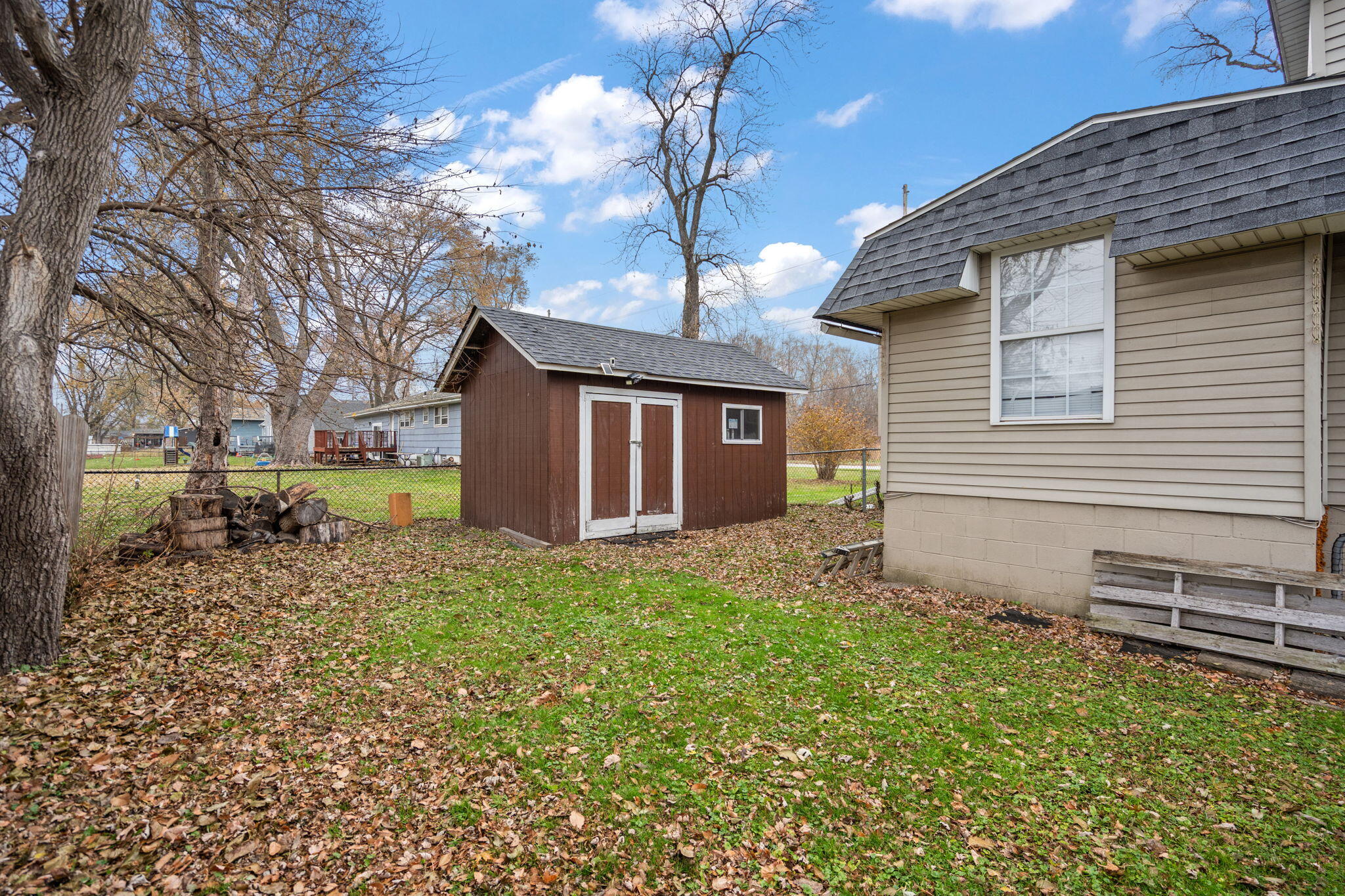 706 North Colfax Street Griffith, IN 46319 - Photo 22 of 25 a view of a house with a yard