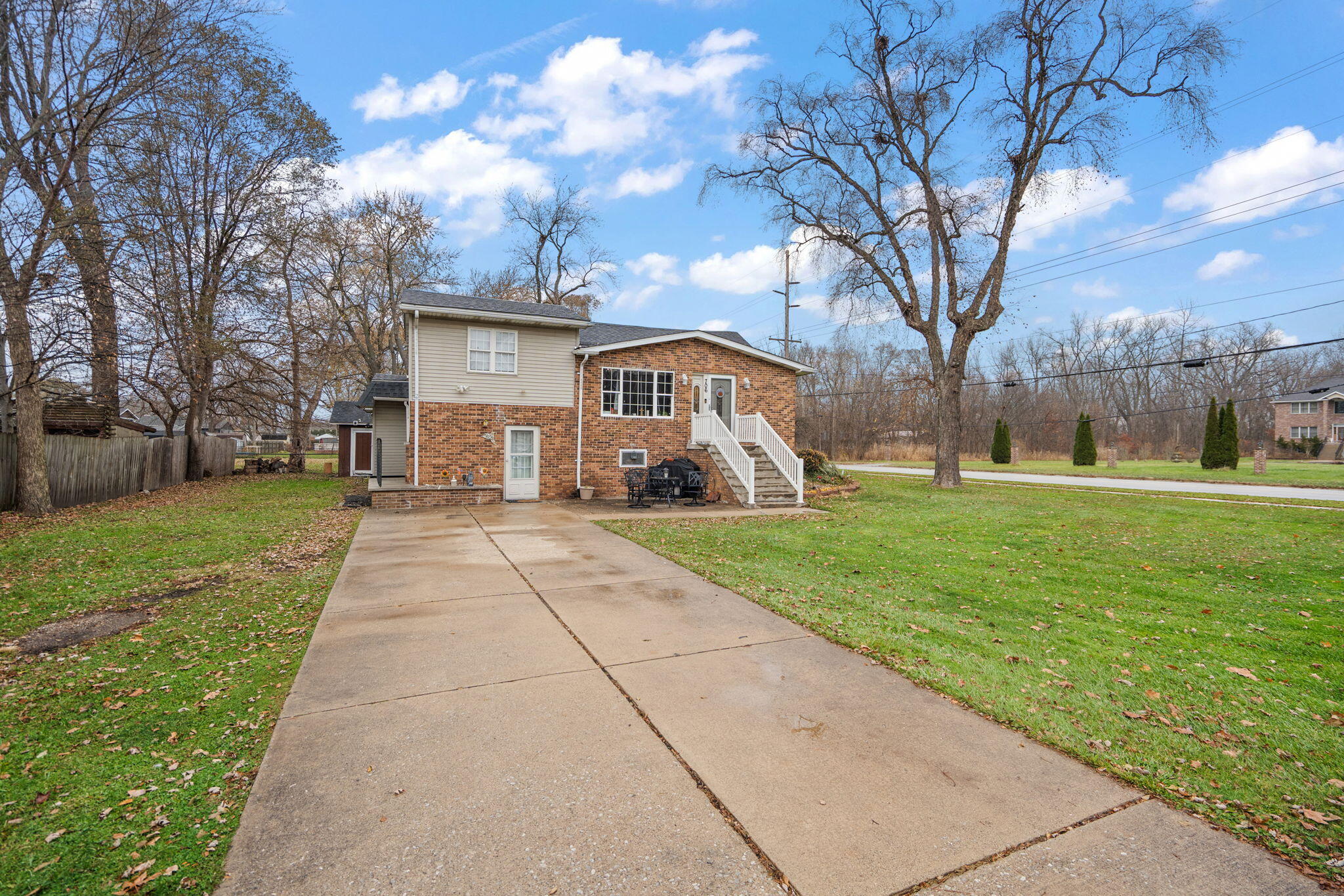 706 North Colfax Street Griffith, IN 46319 - Photo 25 of 25 a front view of a house with a yard