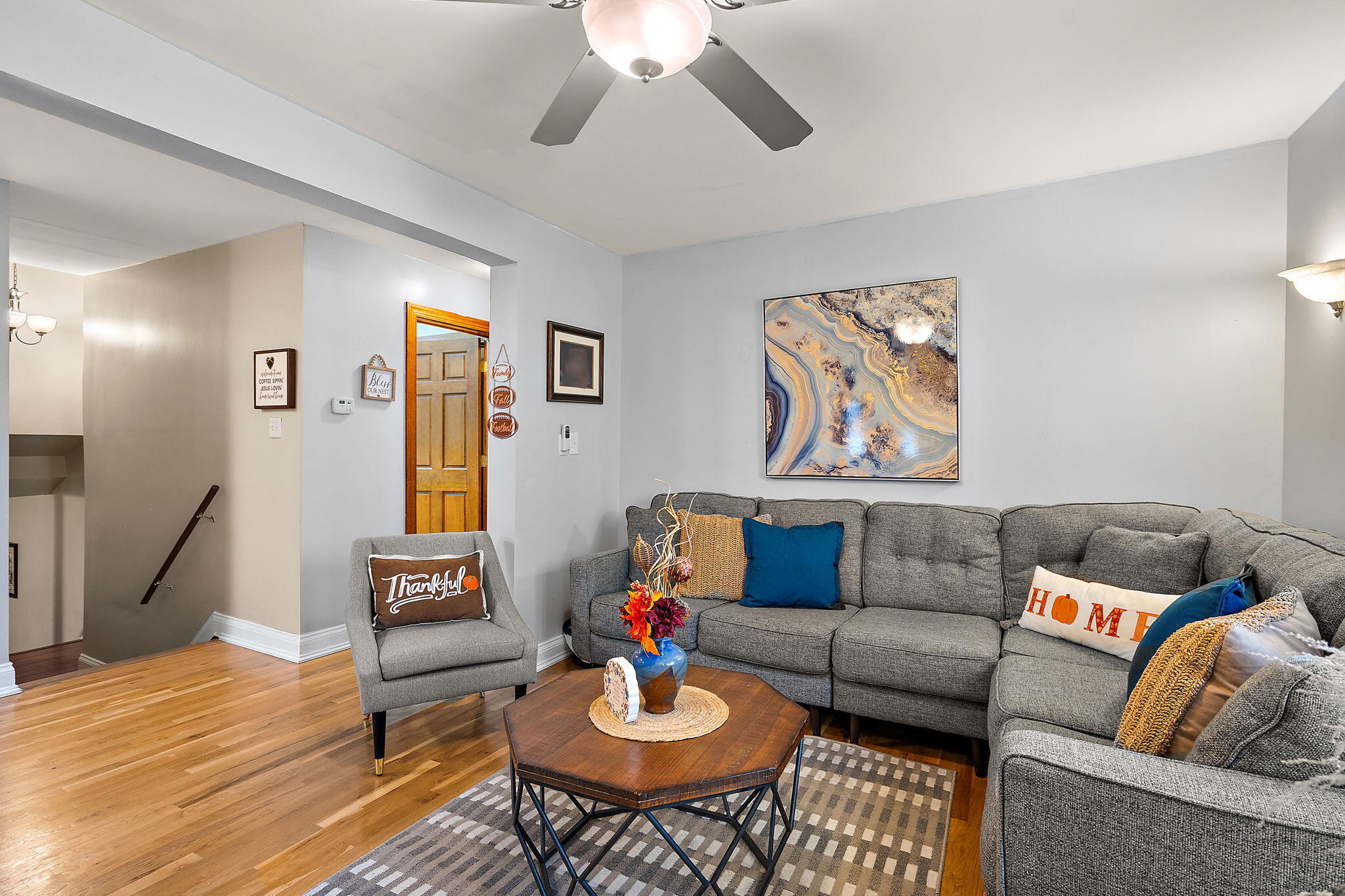 706 North Colfax Street Griffith, IN 46319 - Photo 9 of 25 a living room with furniture and a wooden floor