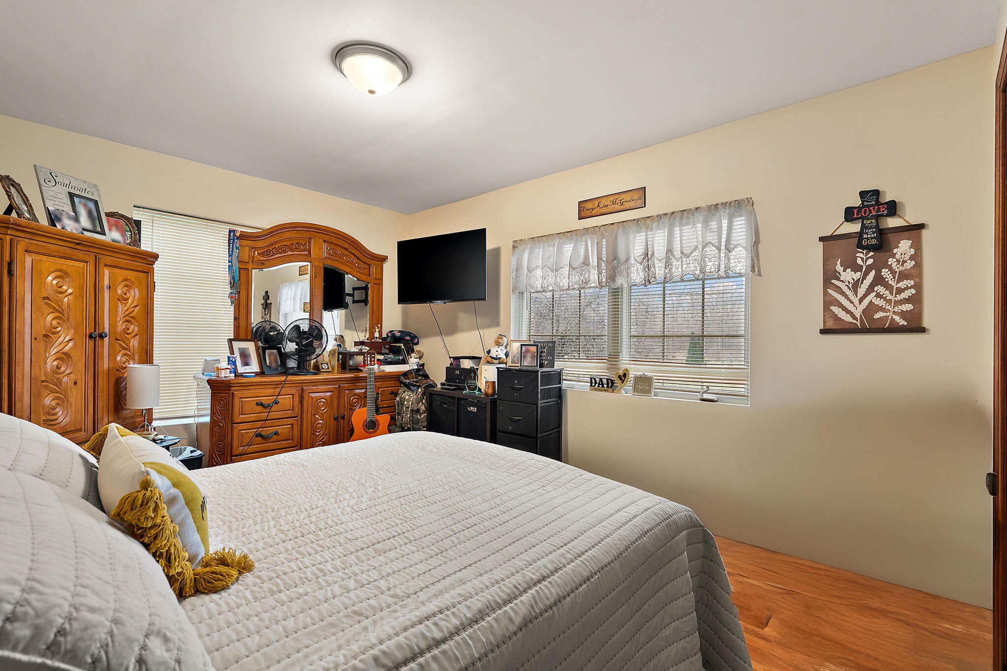 706 North Colfax Street Griffith, IN 46319 - Photo 10 of 25 a bed room with a bed and a large window