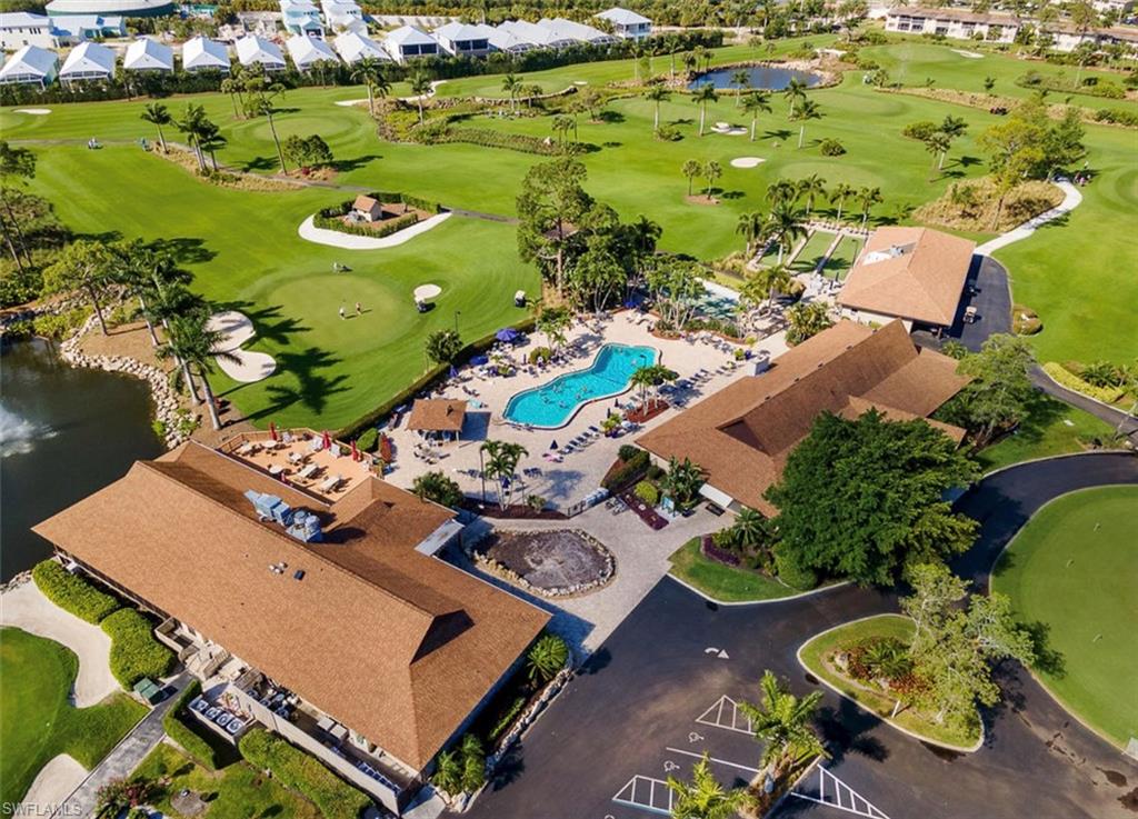 197 Harrison Road, Unit 3 Naples, FL 34112 - Photo 11 of 14 Aerial view of residential area featuring a nearby body of water and a golf course