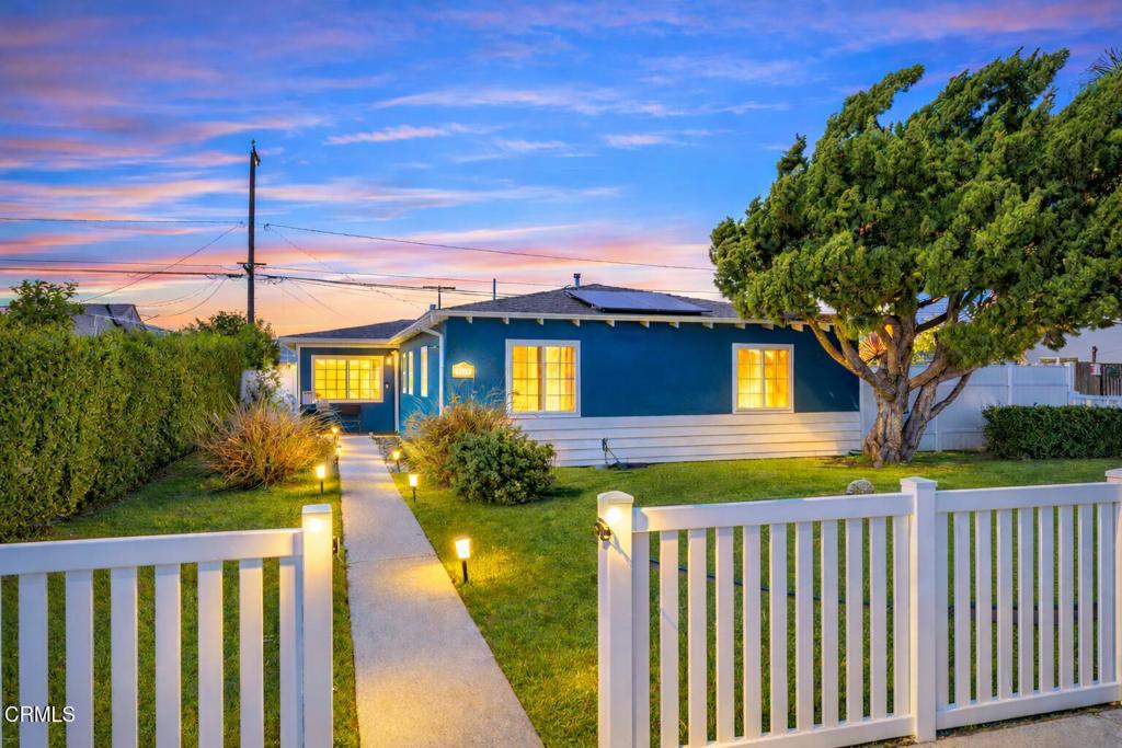 3151 Fournier Street Oxnard, CA 93033 - Photo 1 of 40 a front view of a house with a garden