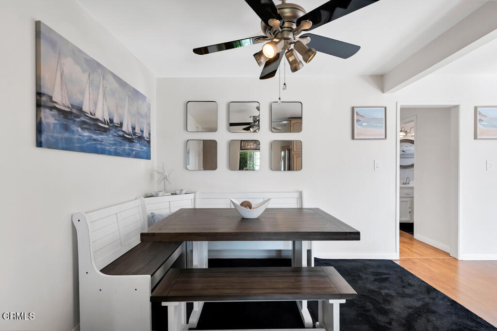 3151 Fournier Street Oxnard, CA 93033 - Photo 12 of 40 a view of a dining room with furniture and chandelier
