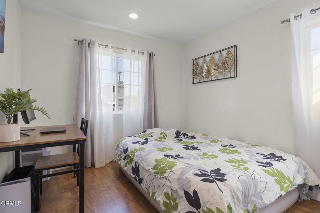 3151 Fournier Street Oxnard, CA 93033 - Photo 19 of 40 a bedroom with a bed and a table in it