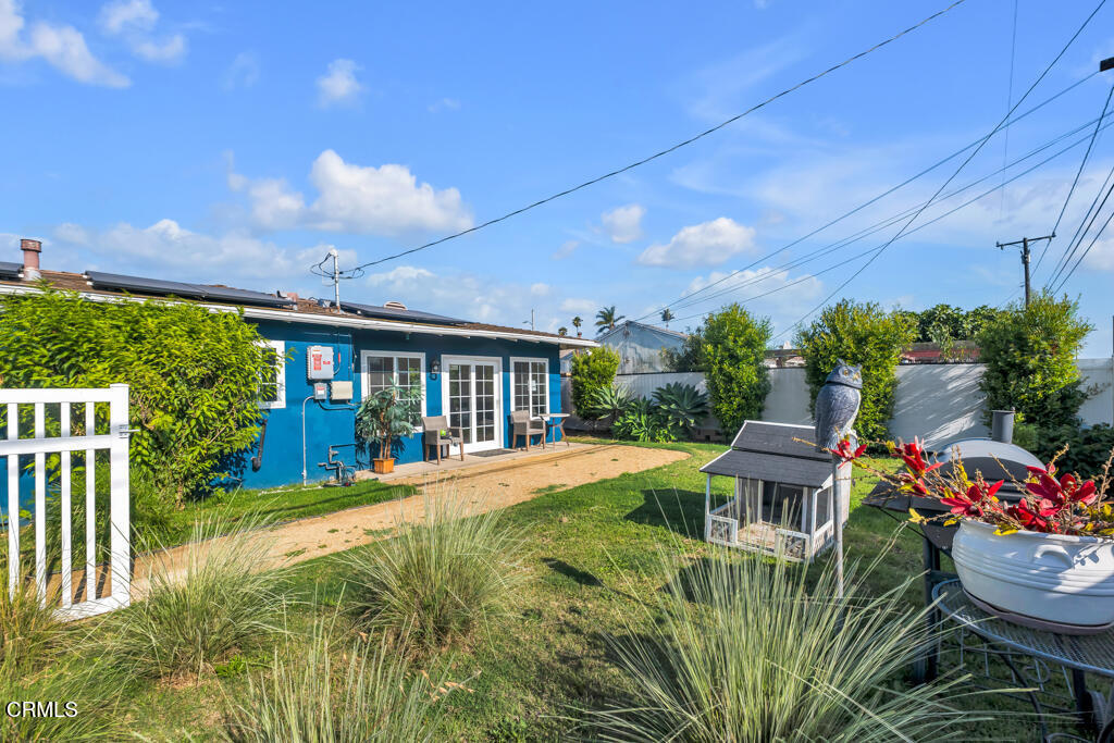 3151 Fournier Street Oxnard, CA 93033 - Photo 23 of 40 a view of a house with backyard sitting area and furniture