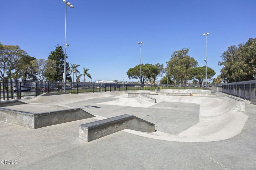 3151 Fournier Street Oxnard, CA 93033 - Photo 35 of 40 a view of swimming pool with outdoor seating and plants