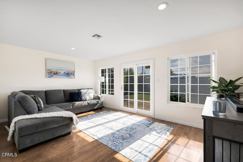 3151 Fournier Street Oxnard, CA 93033 - Photo 5 of 40 a living room with furniture and windows