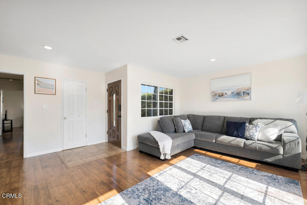 3151 Fournier Street Oxnard, CA 93033 - Photo 6 of 40 a living room with furniture and a couch
