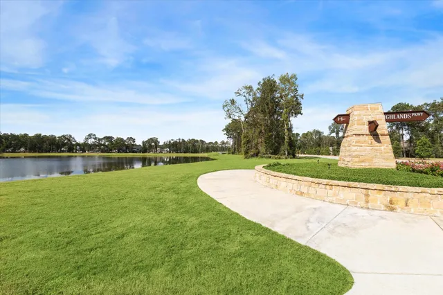 a view of a lake with a big yard