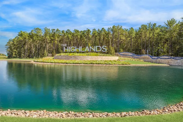 a view of swimming pool and trees