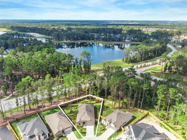 a view of a balcony with an outdoor seating