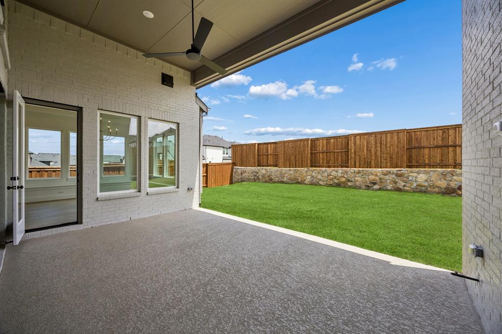 1120 Whirlabout Road Prosper, TX 75078 - Photo 18 of 25 Dining al fresco has never been easier on this spacious, covered back patio!