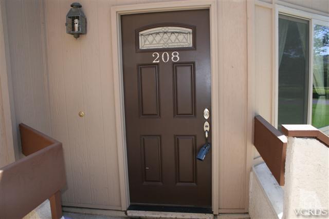 1706 Sinaloa Road, Unit 208 Simi Valley, CA 93065 - Photo 2 of 21 a view of an entryway with wooden floor