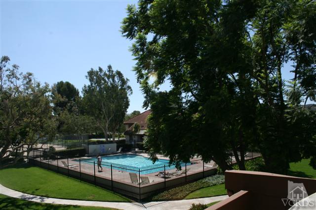1706 Sinaloa Road, Unit 208 Simi Valley, CA 93065 - Photo 18 of 21 a view of a house with backyard and sitting area