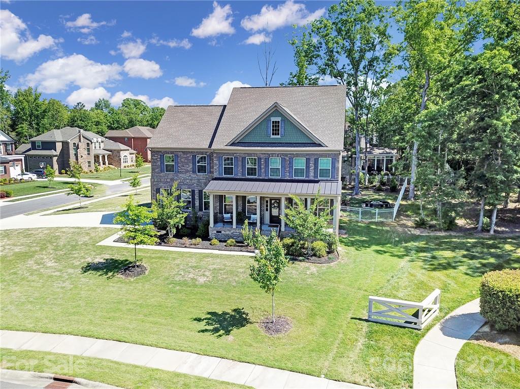 1004 Lightwood Road Waxhaw, NC 28173 - Photo 2 of 48 an aerial view of a house with a yard