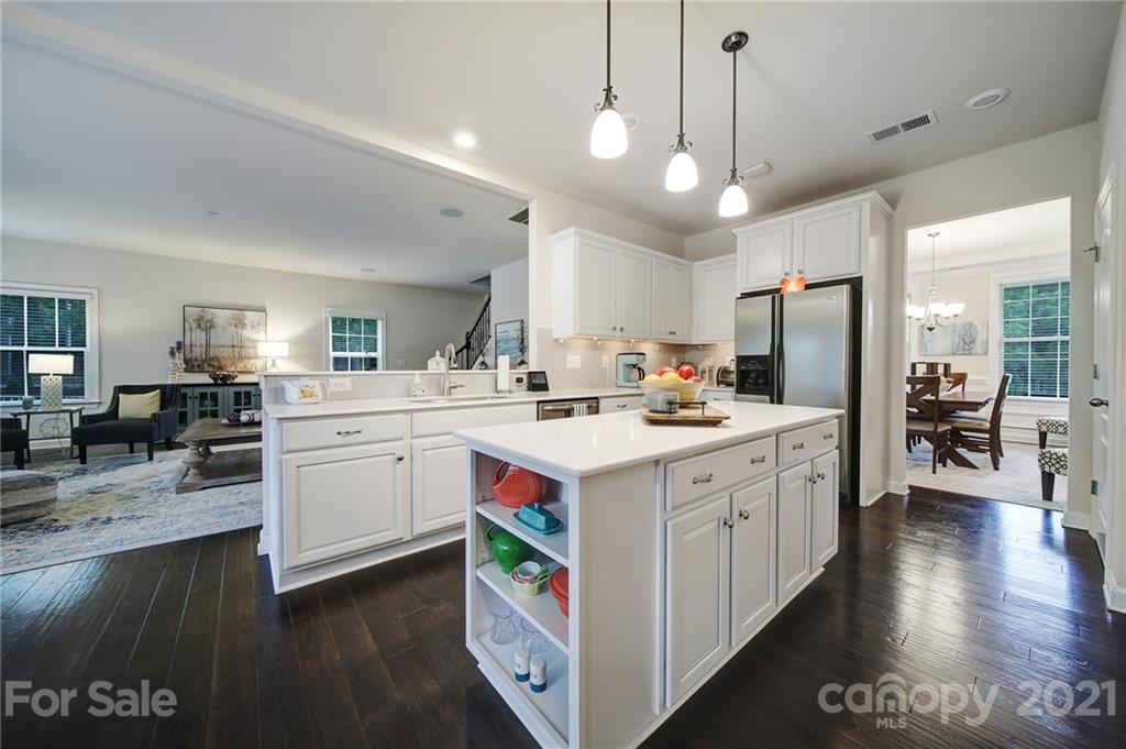 1004 Lightwood Road Waxhaw, NC 28173 - Photo 13 of 48 a kitchen with a sink and cabinets