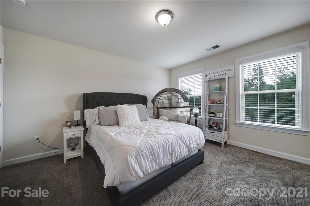 1004 Lightwood Road Waxhaw, NC 28173 - Photo 29 of 48 a bedroom with a bed and window