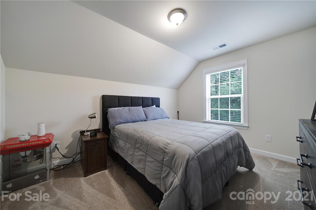 1004 Lightwood Road Waxhaw, NC 28173 - Photo 42 of 48 a bedroom with a bed and a window