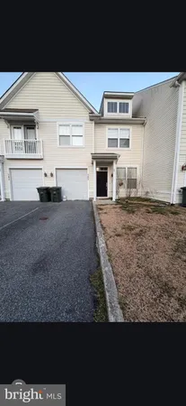 a view of car parked in front of house