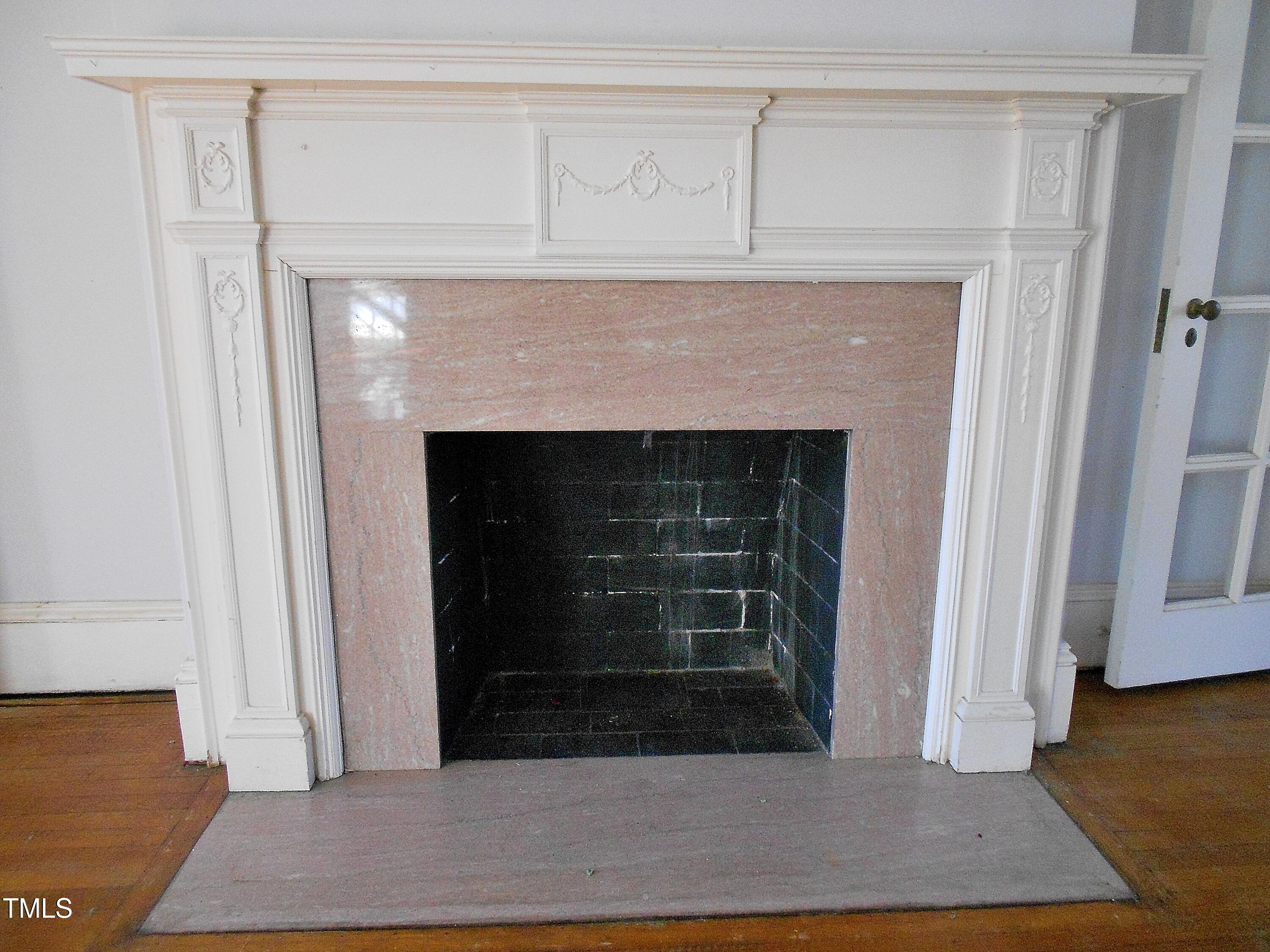 1703 St Marys Street Raleigh, NC 27608 - Photo 9 of 43 Living Room fireplace with attractive mantel