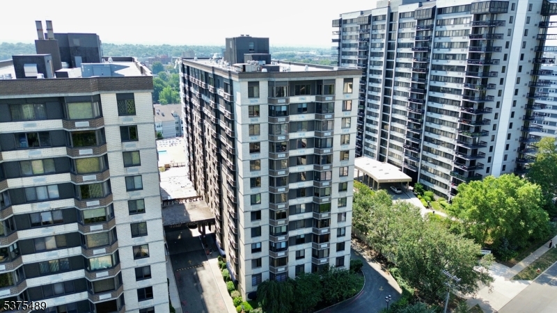 316 Prospect Avenue, Unit A Hackensack, NJ 07601 - Photo 16 of 18 a view of a city with tall buildings