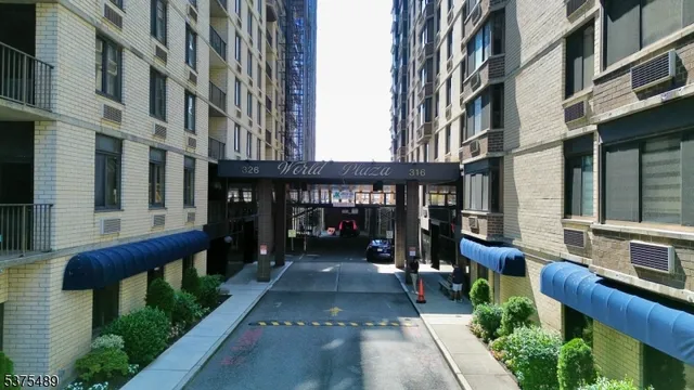 a view of a building with sitting area