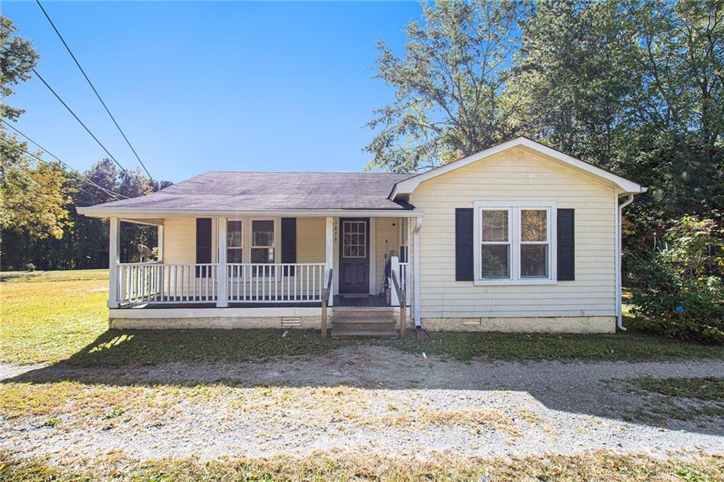 1455 Holly Springs Road Rockmart, GA 30153 - Photo 1 of 1 a front view of a house with a yard