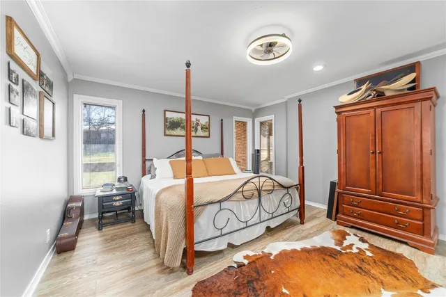 a bed room with a bed and a window