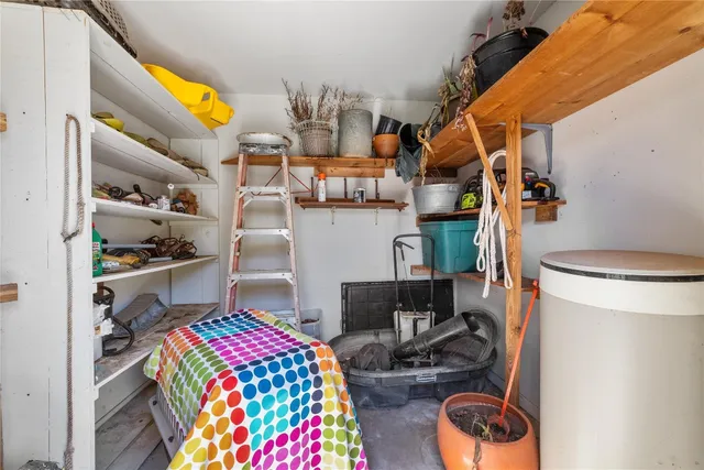 a storage room with washer and dryer