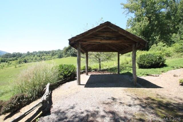 7-9 Gambrell Hill Road, Unit 79 Clyde, NC 28721 - Photo 7 of 24 a house view with a garden space