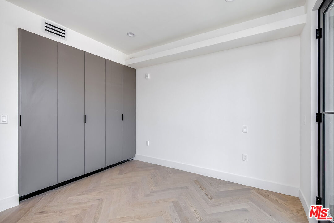 10352 Riverside Drive, Unit 301 Toluca Lake, CA 91602 - Photo 14 of 19 a view of an empty room