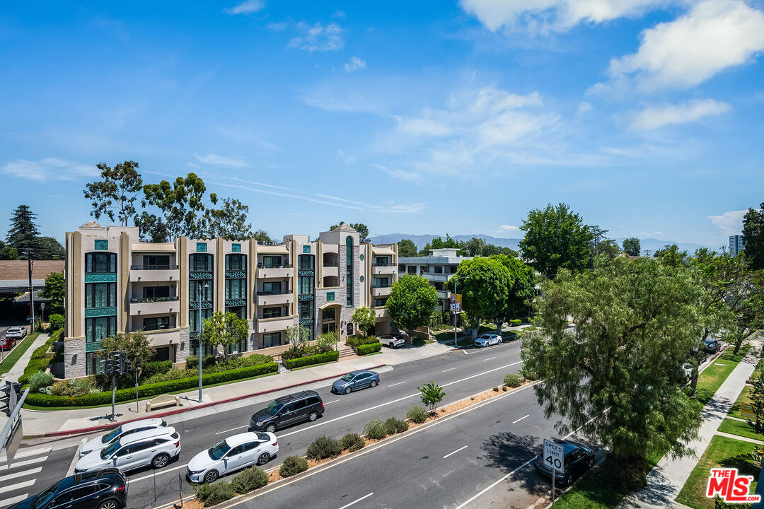 10352 Riverside Drive, Unit 301 Toluca Lake, CA 91602 - Photo 9 of 19 a view of a city with tall buildings