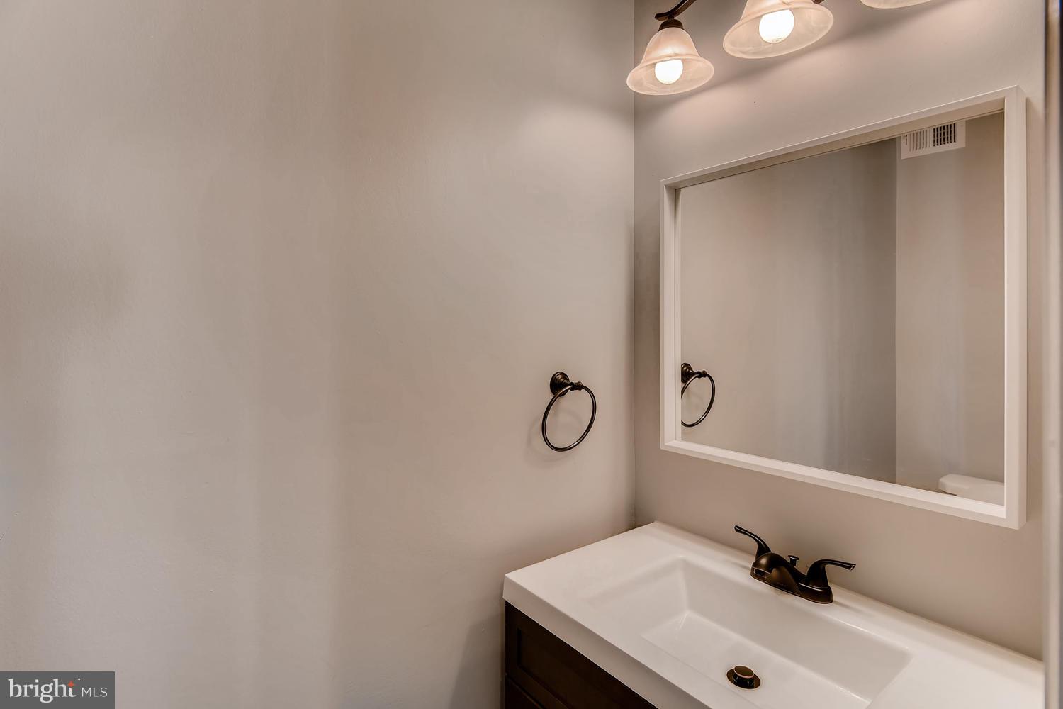 10011 Magledt Road Baltimore, MD 21234 - Photo 18 of 26 Main level half bath
