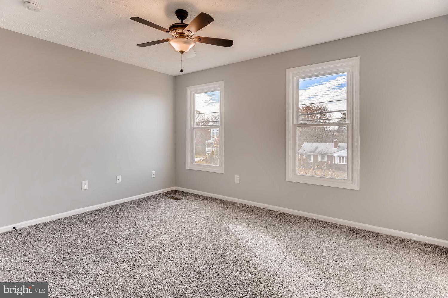 10011 Magledt Road Baltimore, MD 21234 - Photo 21 of 26 Second bedroom w/new carpet and fresh paint