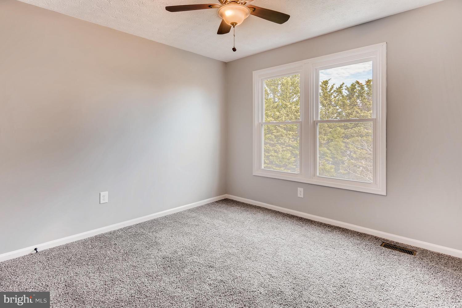 10011 Magledt Road Baltimore, MD 21234 - Photo 22 of 26 Third bedroom w/new carpet and fresh paint