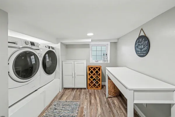 a utility room with dryer and washer