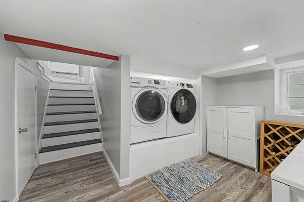a utility room with washer and dryer