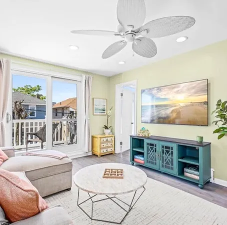 a living room with furniture and a table